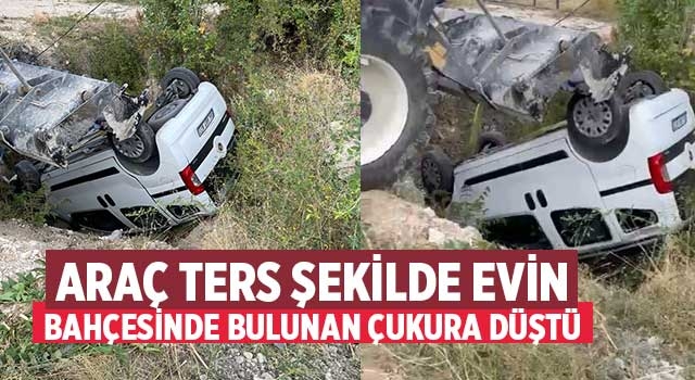 Araç ters şekilde evin bahçesinde bulunan çukura düştü