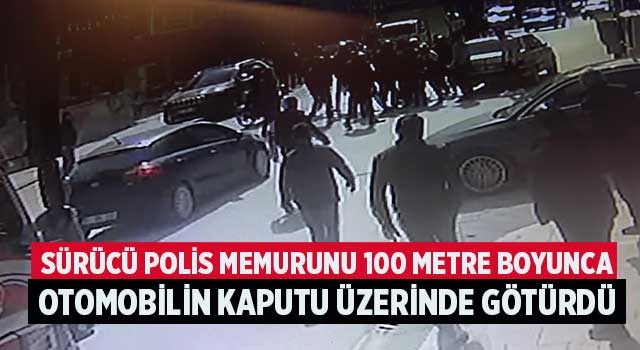 Sürücü polis memurunu 100 metre boyunca otomobilin kaputu üzerinde götürdü